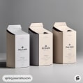 Three tall, slender boxes in neutral colors with minimalistic design.