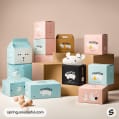 Stacked pastel boxes featuring playful animal illustrations with 'munio' branding.