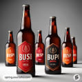 Five beer bottles with bold red and black geometric labels