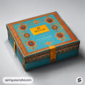 Turquoise box with intricate floral design on light surface.