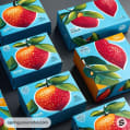 Multiple mailer boxes with large strawberry and orange graphics on blue backgrounds.