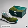 Green shoe with texture in dark green box with landscape design.