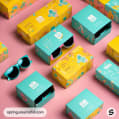 Yellow and teal boxes with cartoon-style designs and sunglasses on a pink background.