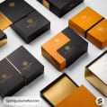 Premium black and orange boxes with elegant gold detailing.