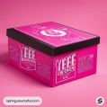 Large pink box with vintage label design on a pink backdrop.