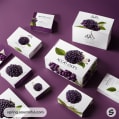 Acai oats packaging with prominent berry design on purple background.