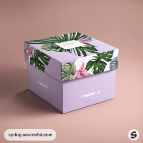 Lavender box with green tropical leaf lid design.