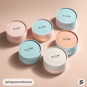 Round skincare containers in pink, blue, and white.