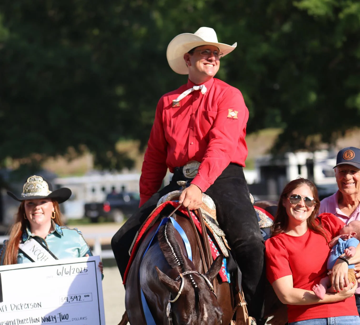 Taft Dickerson and his partner Kate, son Kole, and father Donnie Dickerson