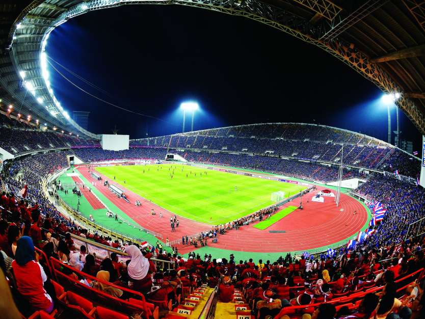 Night shot of a full stadium during the Mitsubishi Electric Cup 2024 qualifiers.