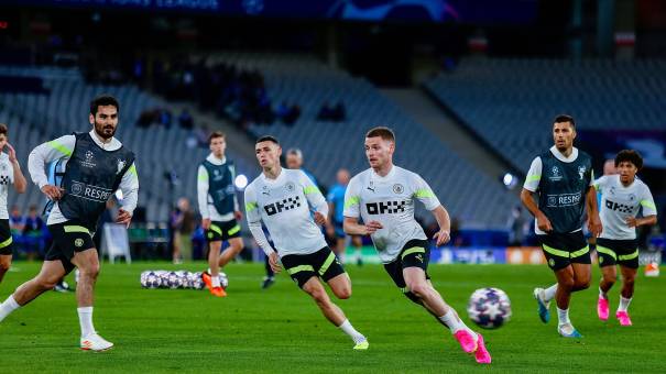 Manchester city warm-up before a Champions League match