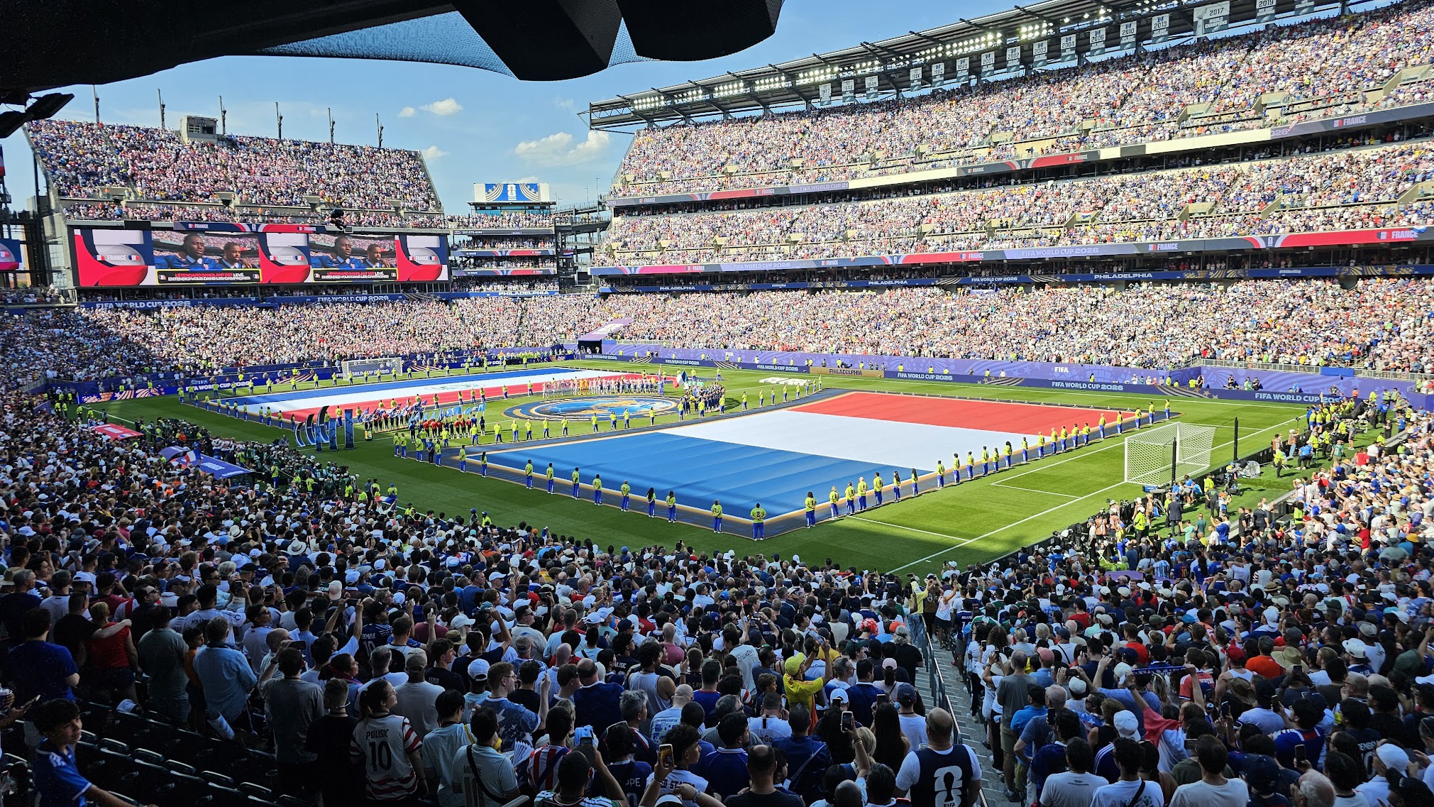 A giant French flag unfurled across the pitch at Lincoln Financial Field before the France vs. Paraguay Round of 16 match