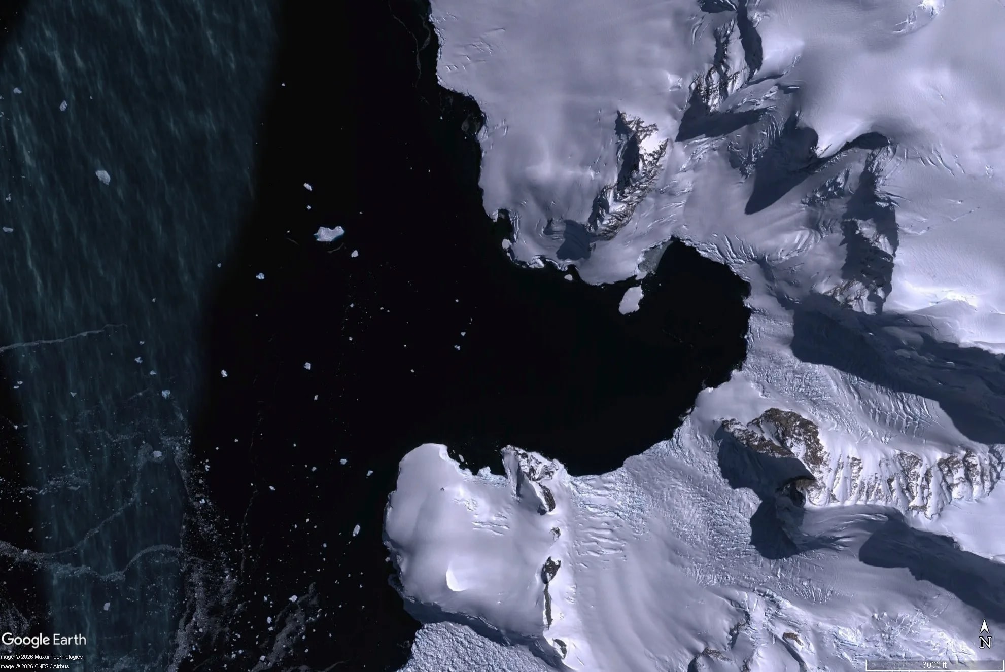 Antarctica zodiac and icebergs