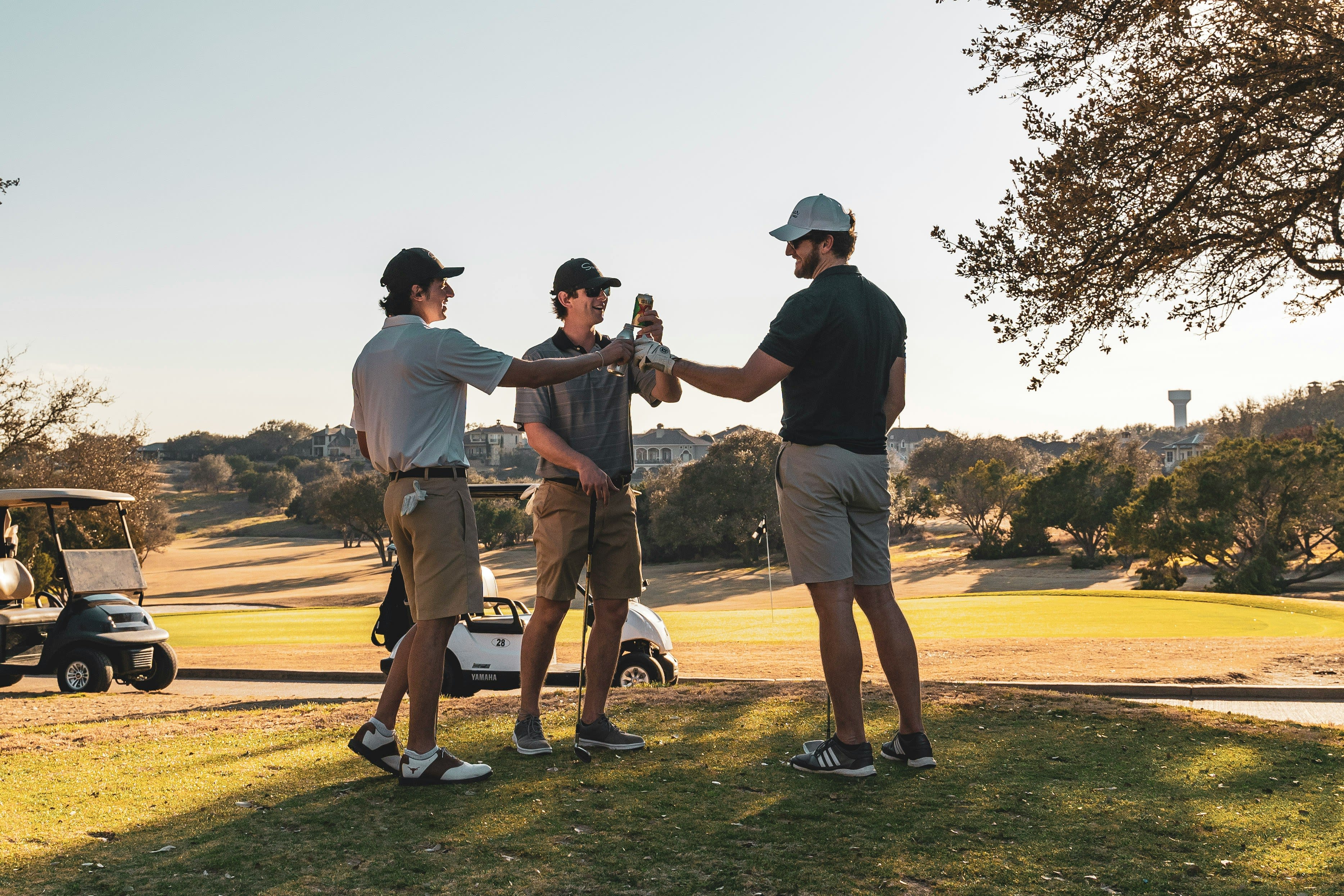 Group of golfers celebrating a great round together