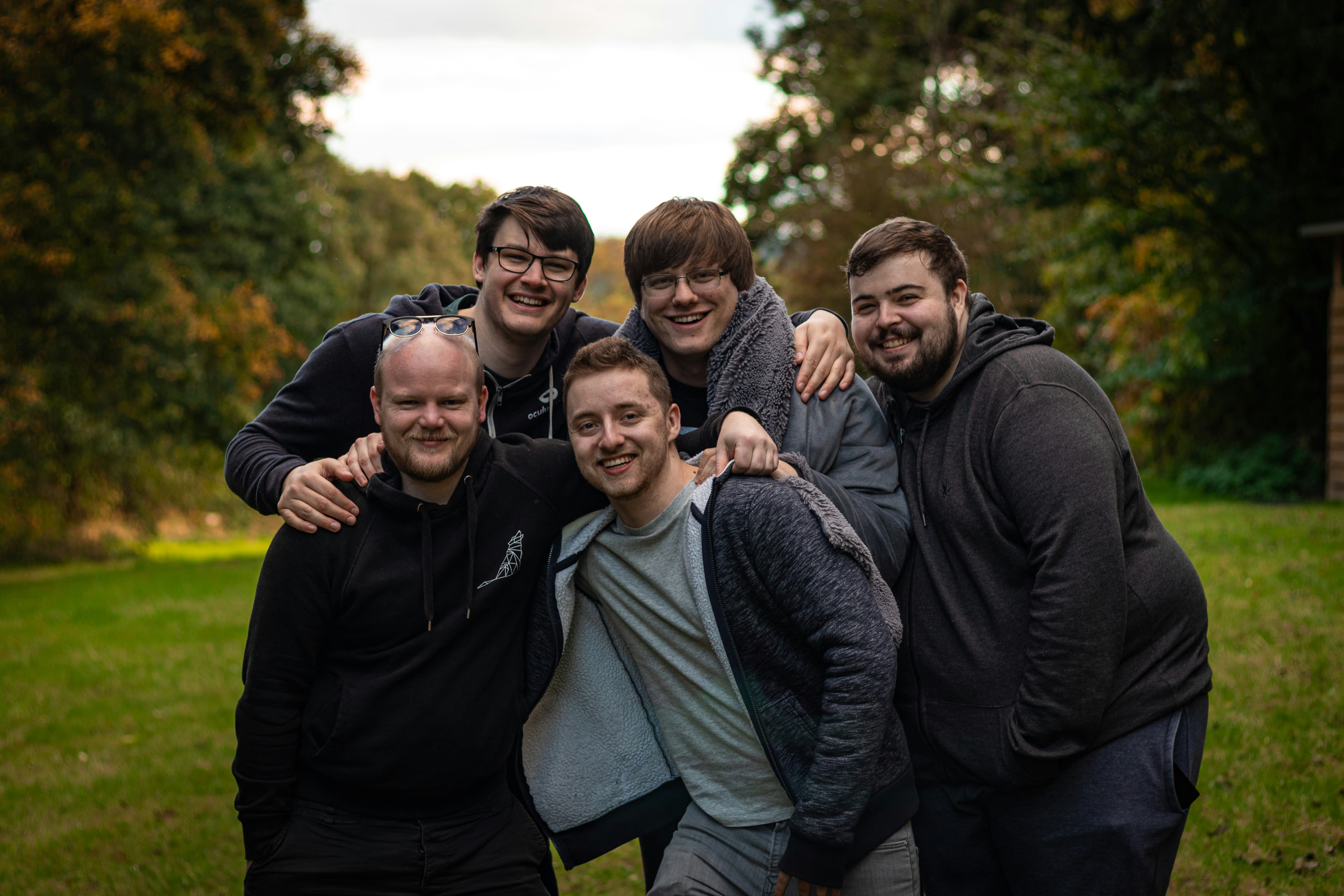 Group of friends together in an autumn park