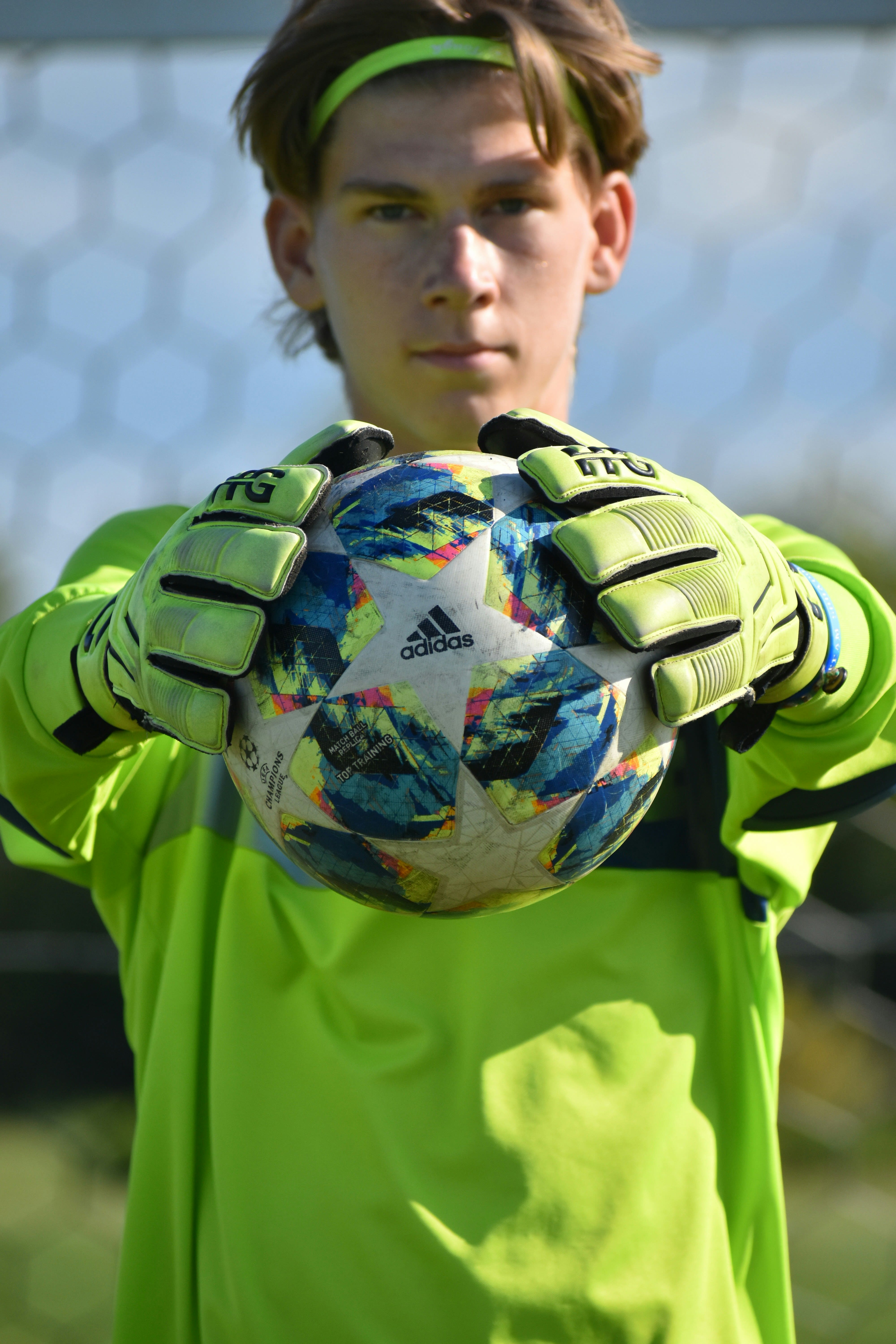 Young goalkeeper in full focus before a match