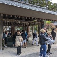 Visitors queueing to wash their hands