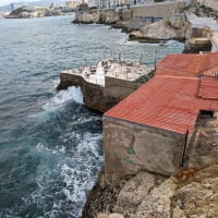Sea eroding the restaurant dining area
