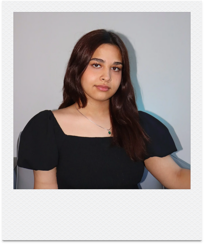 Seba smiling softly at the camera