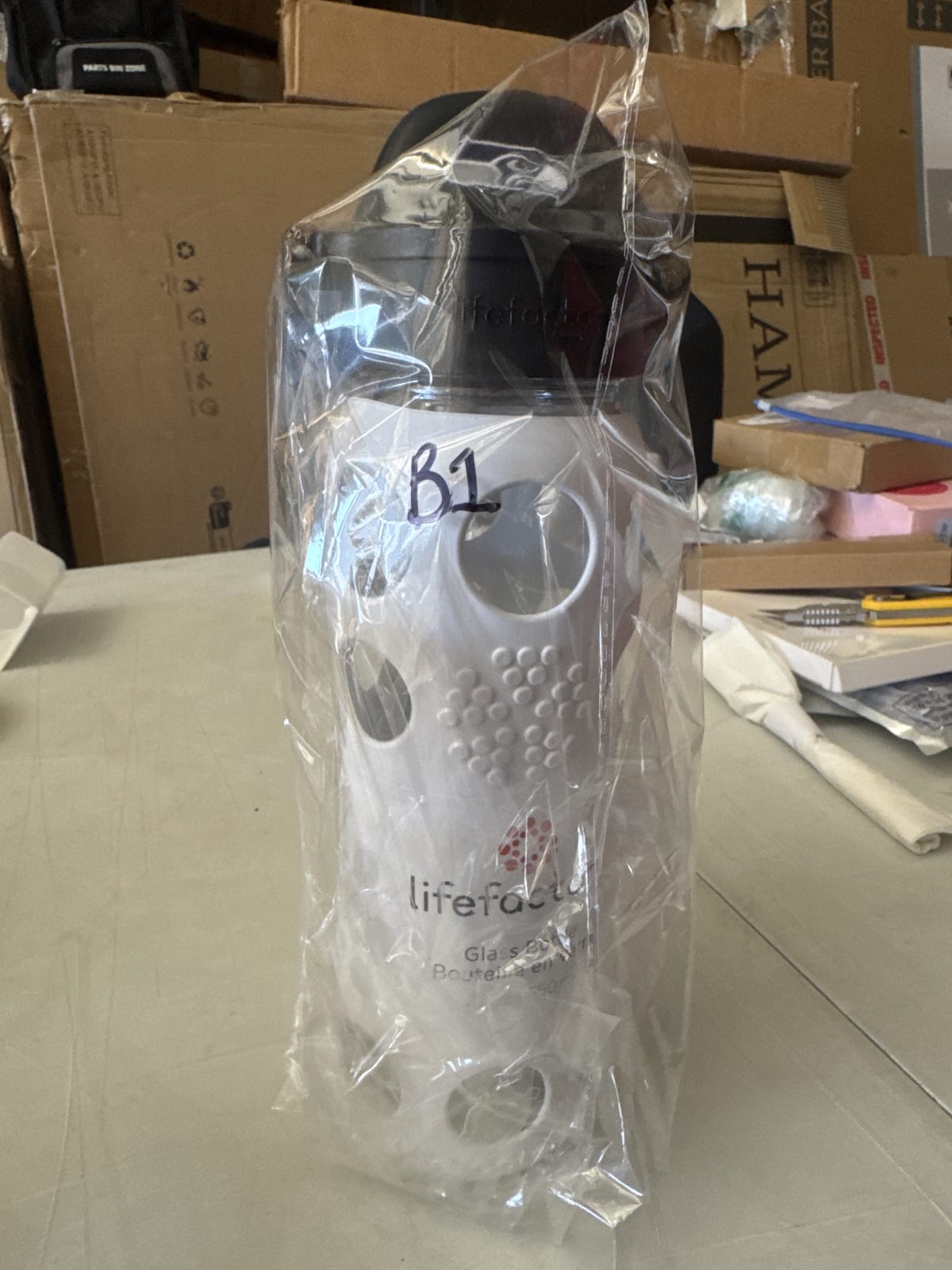 Lifefactory 22 oz Glass Water Bottle with Silicone Sleeve - White