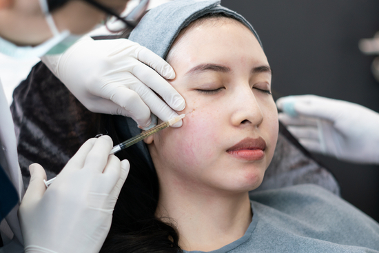 Woman getting injected