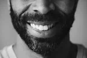 smiling man with a beard