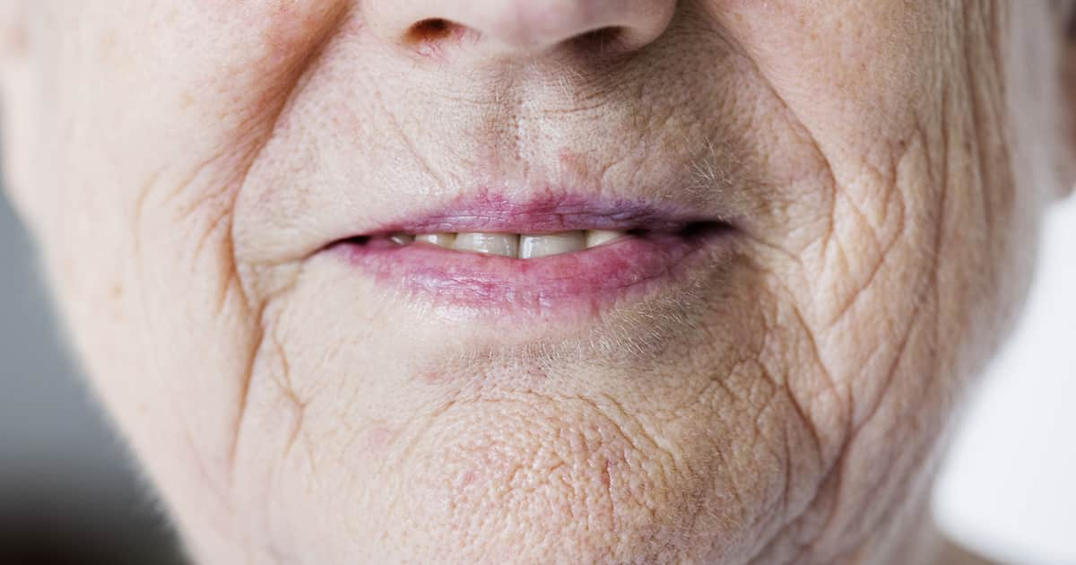 old lady smiling with teeth showing