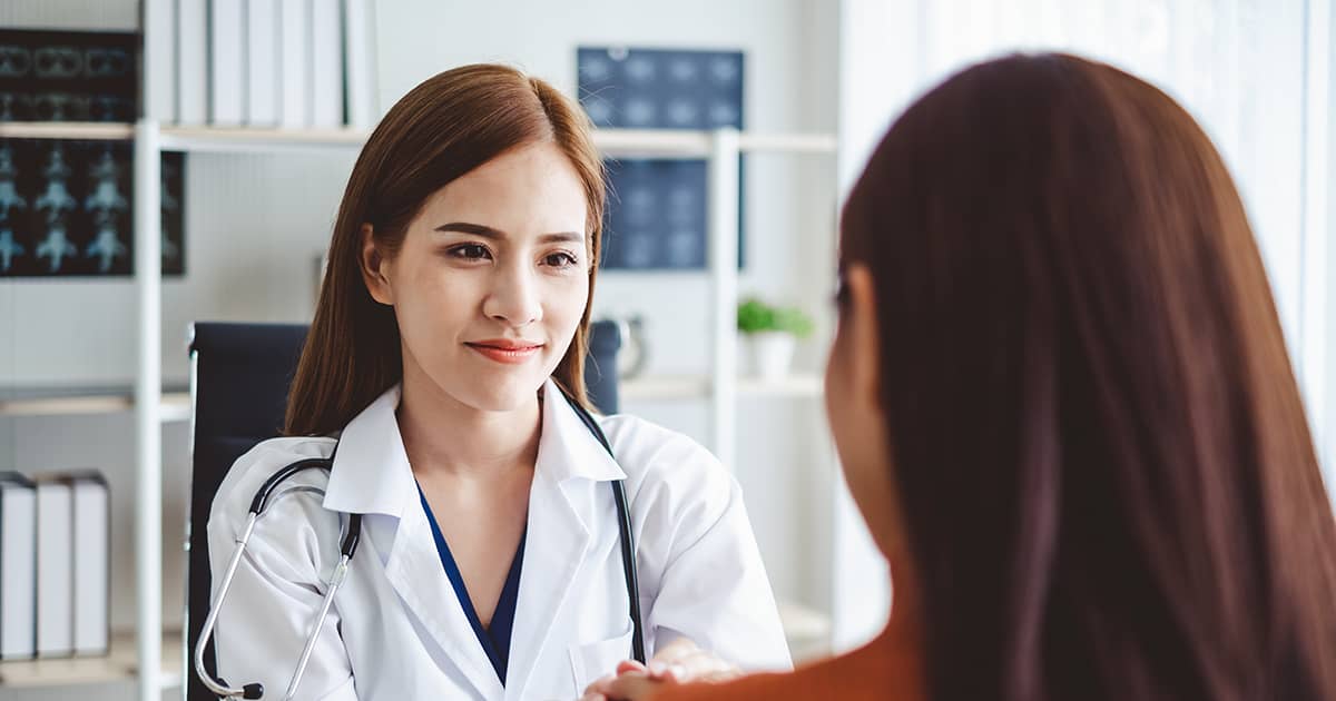 a doctor and patient chatting