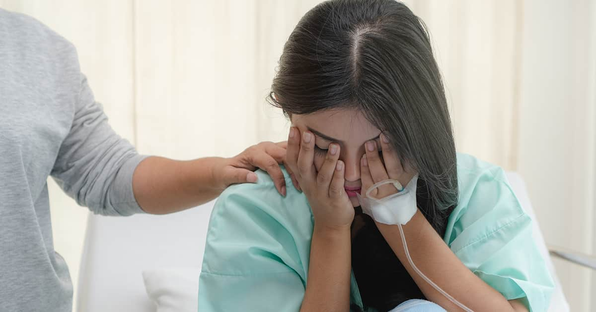 a patient with an iv drip