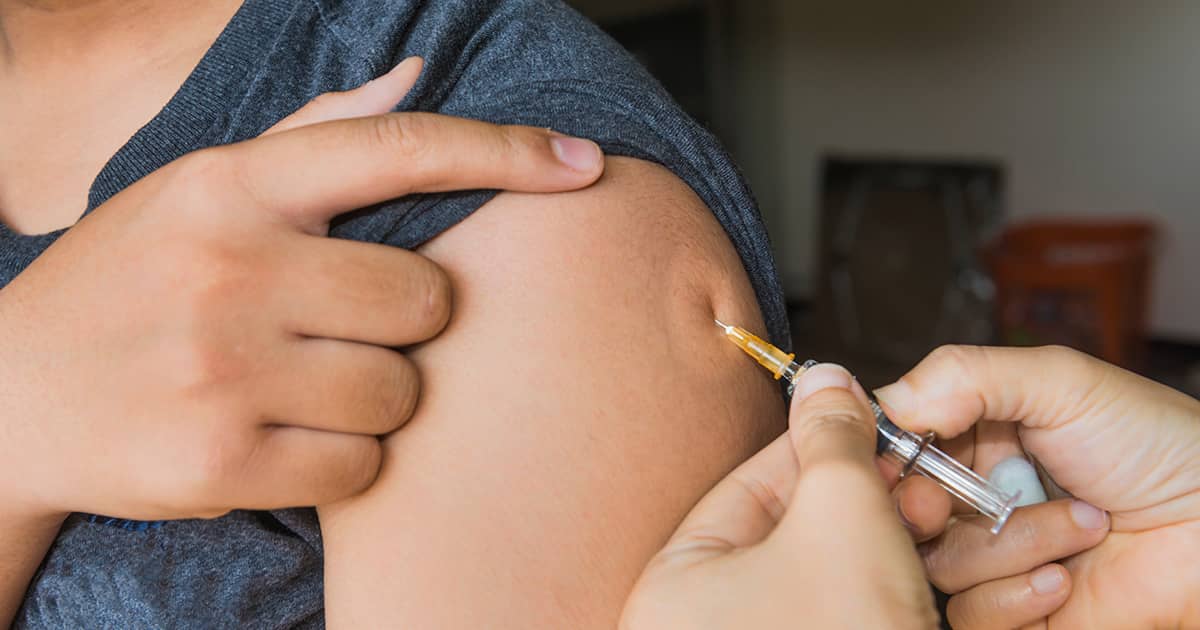 man getting an injection