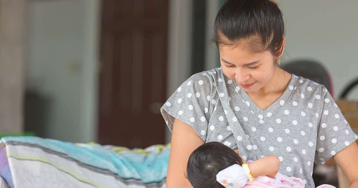 woman with baby at home