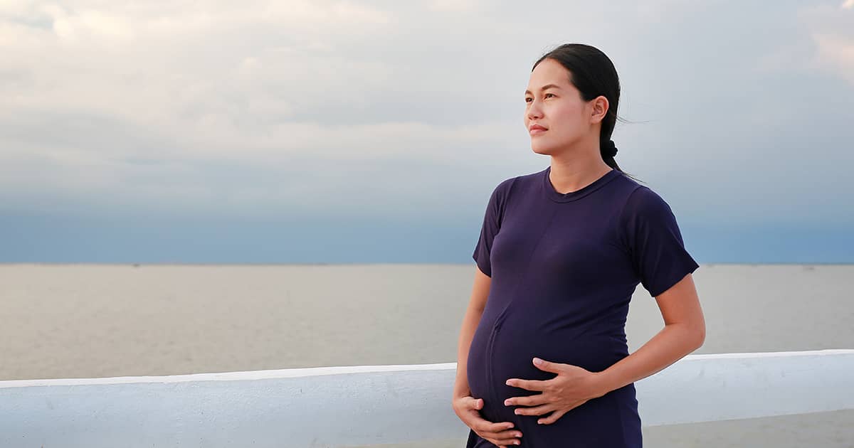 pregnant woman at the beach