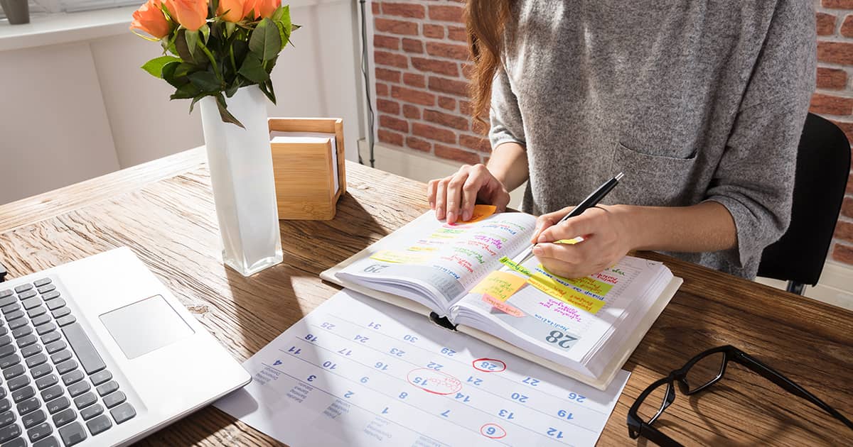 a woman with an organiser book