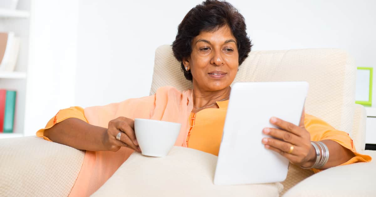 lady doing online research in her living room