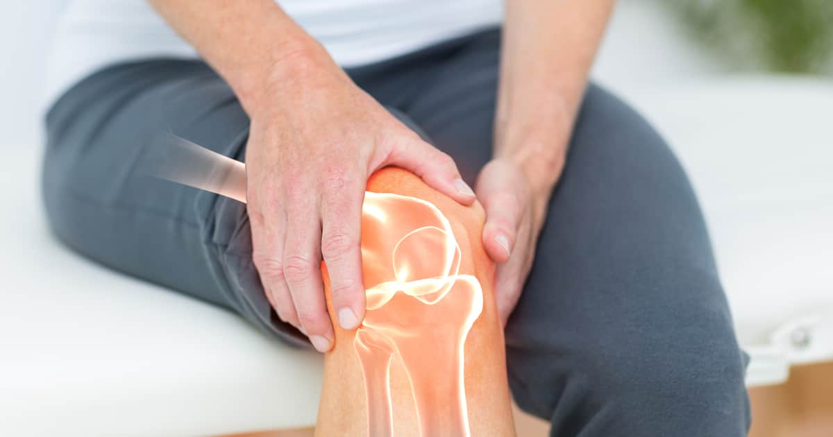 man suffering pain from knee