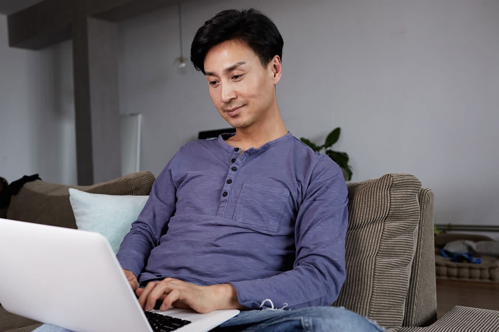 Vitiligo patient researching on the laptop