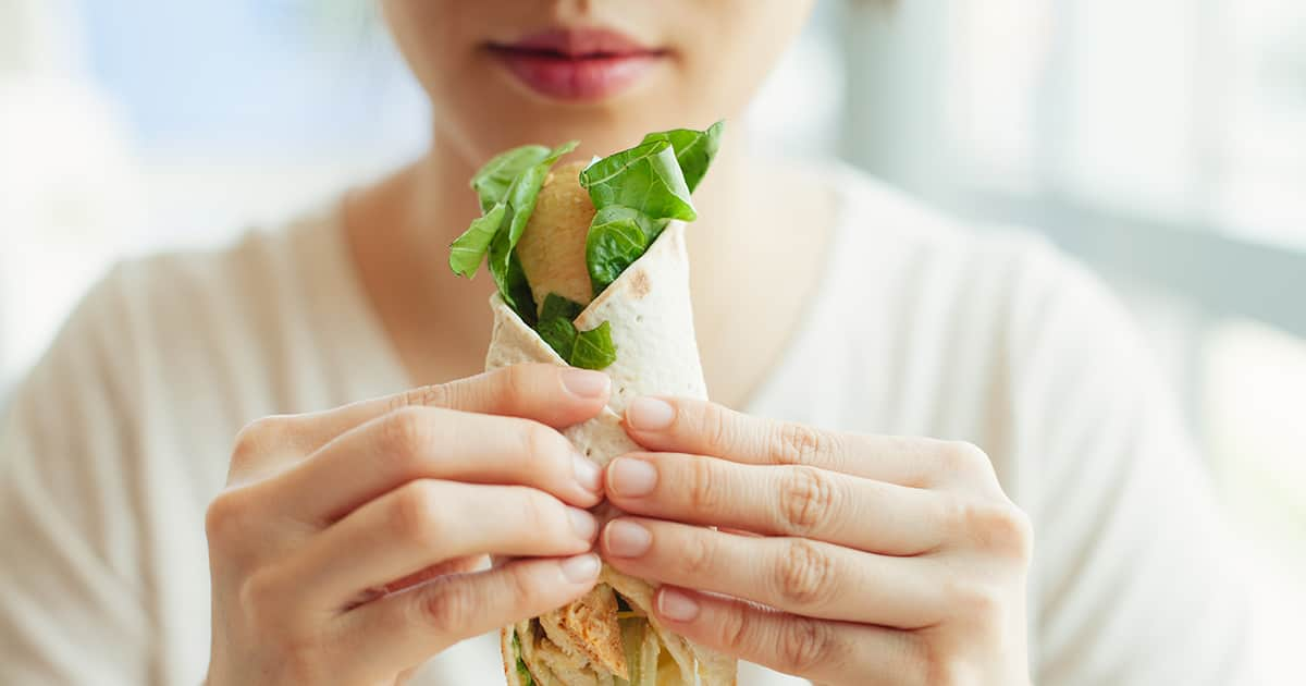 asian woman eating food