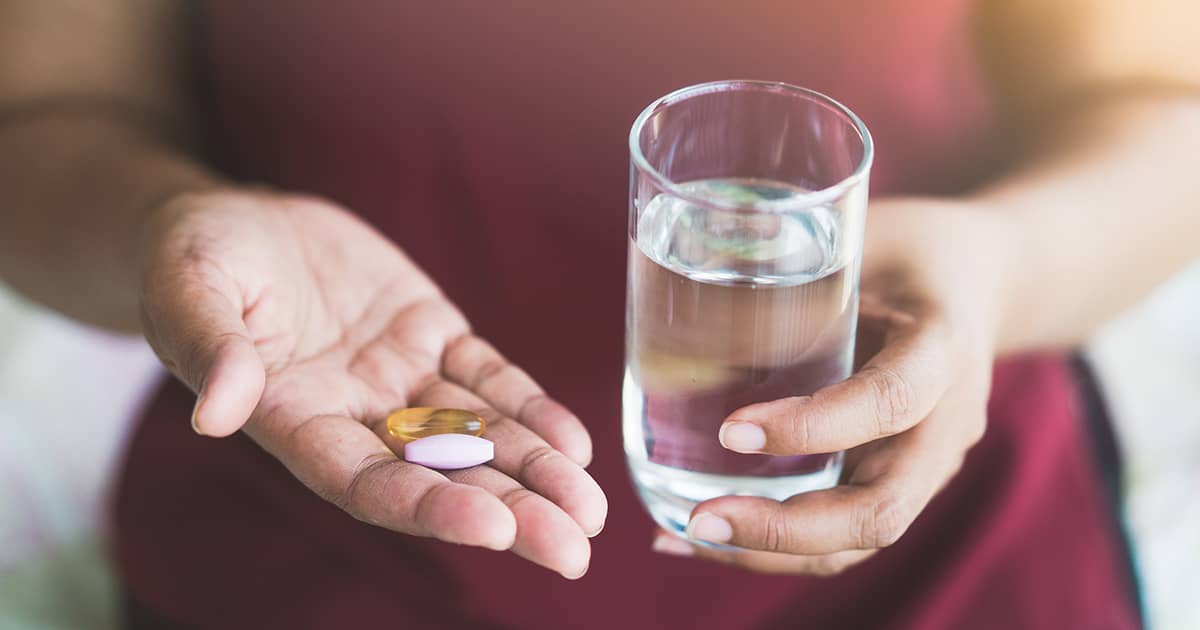 pills-on-woman-hand