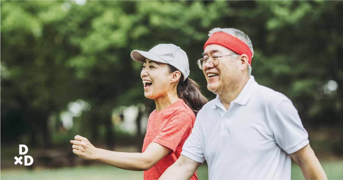 Elderly couple out doing sports