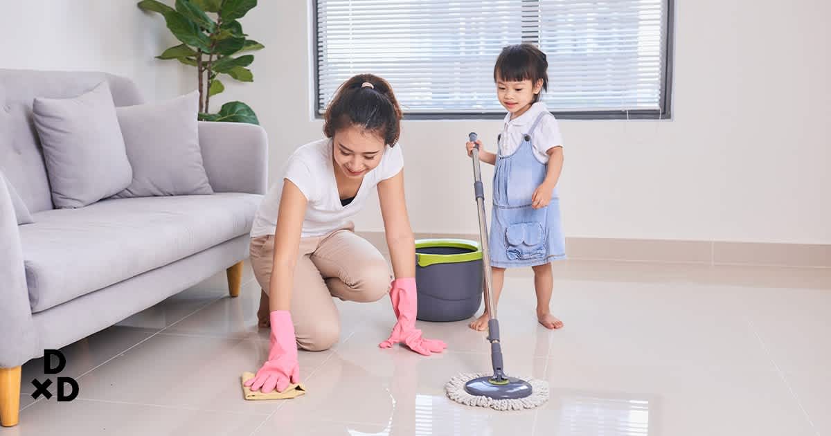 Woman and child cleaning floor 