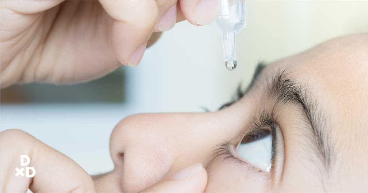 Person using eye drops for their dry eyes