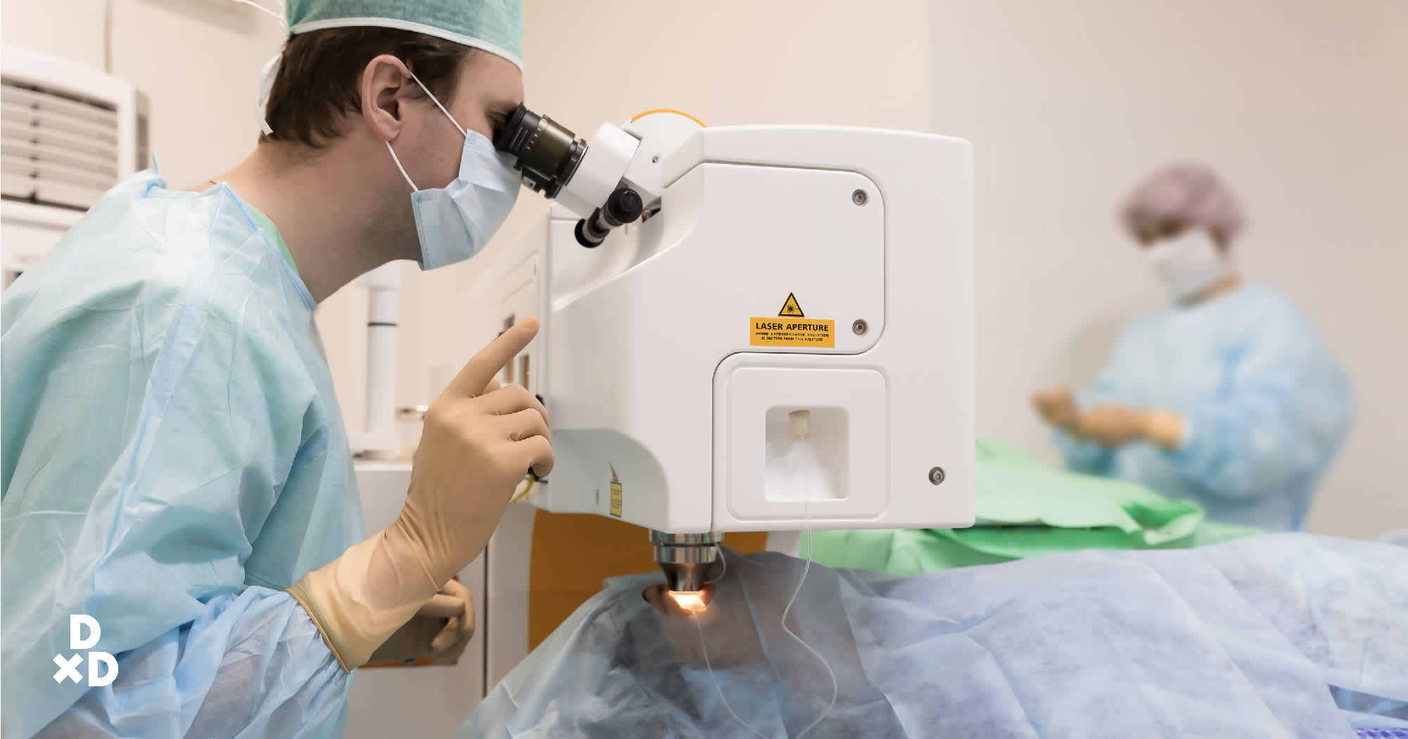 Eye doctor treating patient for LASIK