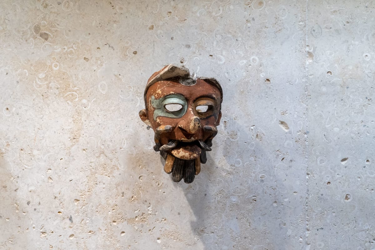 Ancient Maya ceramic face mask displayed in one of the museums in Mérida, Yucatán