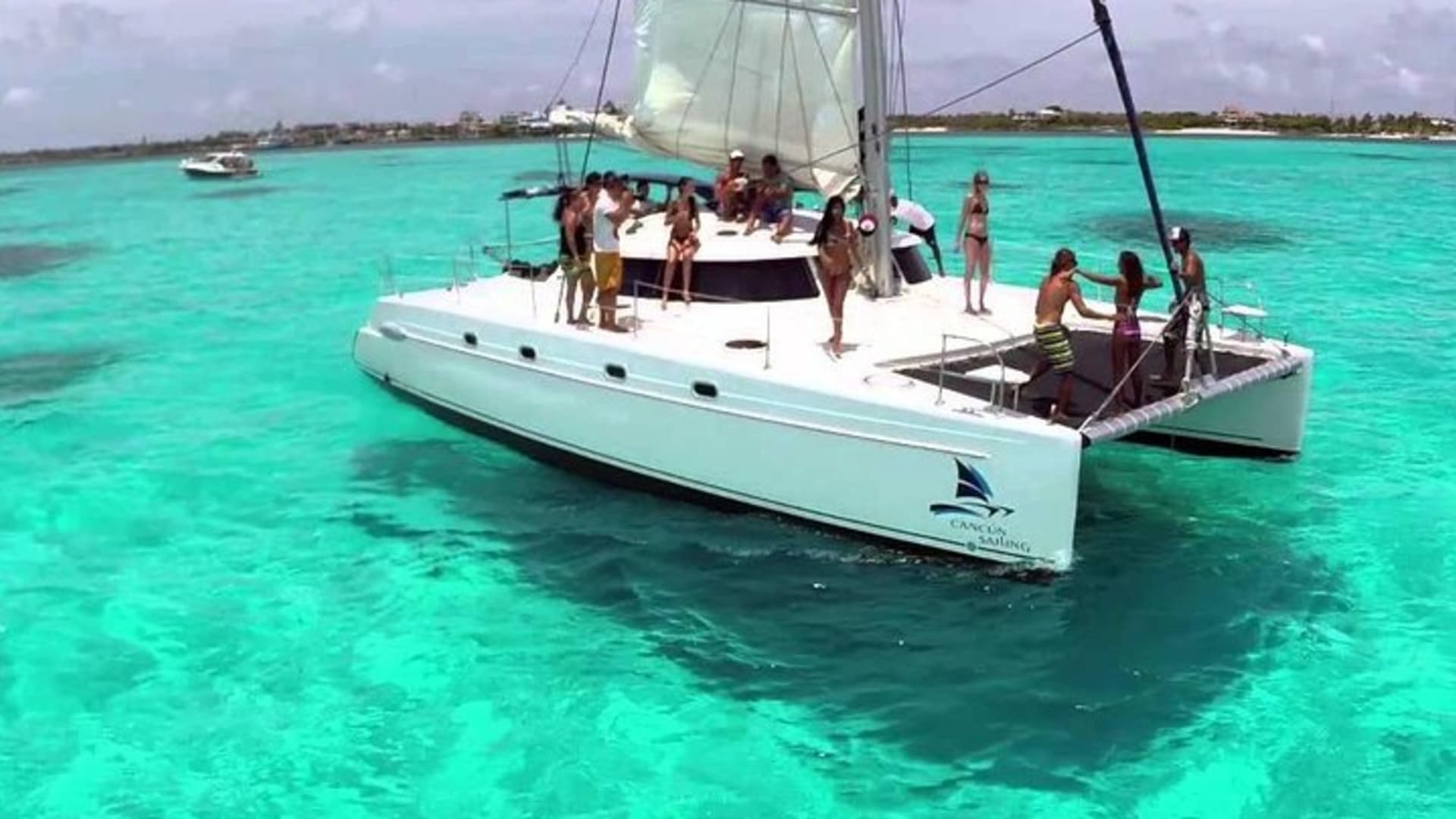 Catamaran to Isla Mujeres with Snorkel, Open Bar & Beach Club