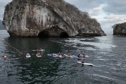 Aventura privada de yoga en SUP y snorkel en Los Arcos — photo 2