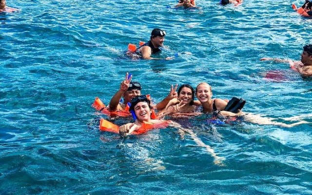 Isla Mujeres adventure by Catamaran. Snorkel, open bar and lunch photo 10