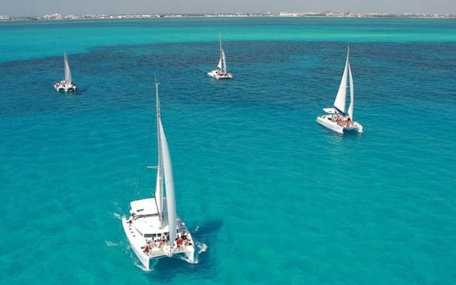 Catamaran to Isla Mujeres with Snorkel, Open Bar & Beach Club photo 5