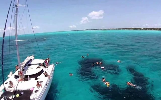 Catamaran to Isla Mujeres with Snorkel, Open Bar & Beach Club photo 7