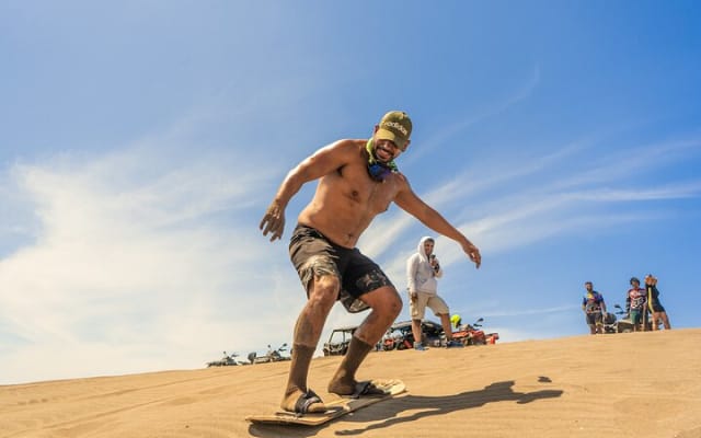 Sandboarding at the Mogote Dunes