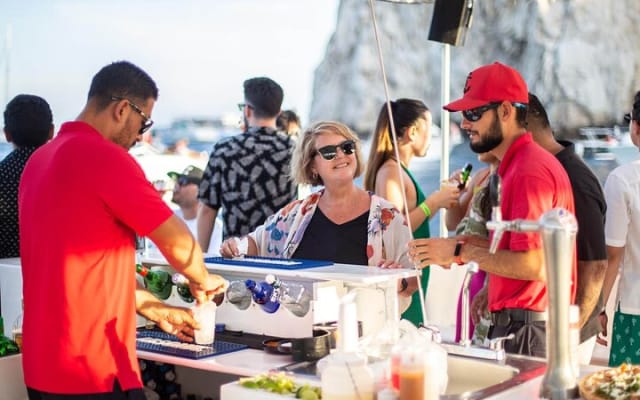 Sunset Party Cruise with Unlimited Drinks and Snacks